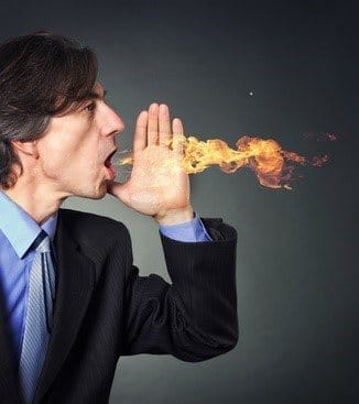 man suffers from heartburn